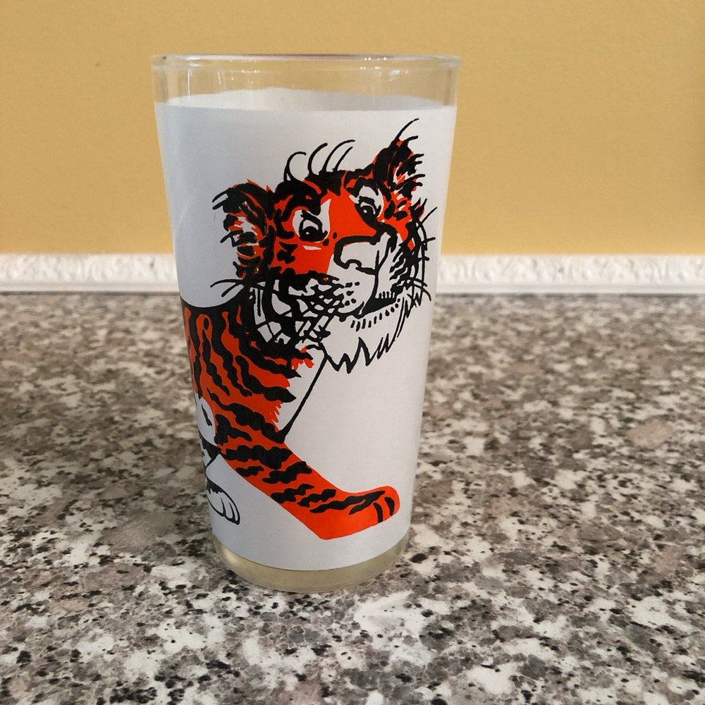 Promotional drinking glass ESSO tiger mascot gasoline tank orange black 1960s